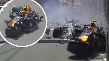 Sergio Perez crashes with Kevin Magnussen and Nico Hulkenberg (not pictured) on lap one of the Monaco Grand Prix.