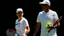 Simona Halep practices with coach Darren Cahill.