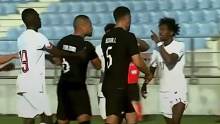 New Zealand's Michael Boxall is taunted by a Qatari player in an international friendly.