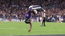 Lamar Jackson backflips into the endzone for a touchdown.