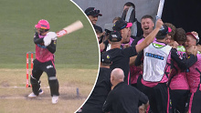 Moises Henriques leads the Sydney Sixers to a final-ball victory.