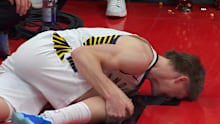 Johnny Furphy injures his knee