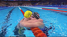 Kaylee McKeown and Katie Ledecky embrace after the final of the 800m freestyle on Saturday, August 3, 2024.