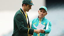 Pat Cummins and Justin Langer before play at the MCG on Boxing Day. 