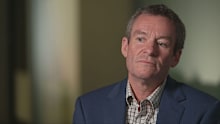 Leading breast cancer surgeon Dr John Stuchbery is one of several senior medical practitioners sacked or suspended by Albury-Wodonga Health (AWH).
