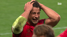 Portugal captain Jose Lima cries after his team defeated Fiji in the final pool match.