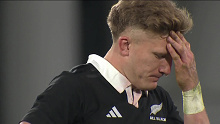 Damien McKenzie reacts after failing to take the penalty kick in time.