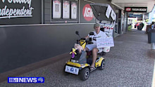 He's known around Australia as "The Mowerman", but Claude Harvey has traded in his trusty clipper for a different set of wheels
