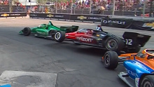Will Power (No.12) gets launched into the air after contact with Scott Dixon (No.9)
