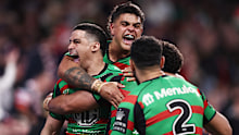 Cody Walker, Latrell Mitchell, and Alex Johnston celebrate after Isaiah Tass' try against the Roosters. 