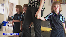 Identical triplets were among thousands of young South Australians to head off for their first day of school this morning, with Abigail, Phoebe, and Hannah Dodd beginning at Vale Park Primary.