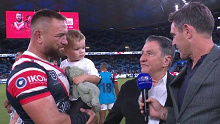 Nick Politis and Jared Waerea-Hargreaves share a moment on the field after the Roosters star's 300th NRL game.