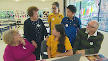 Seniors are learning new technology from school kids.