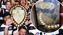 Hawke's Bay players loft the Ranfurly Shield, which was later broken during post-match celebrations.