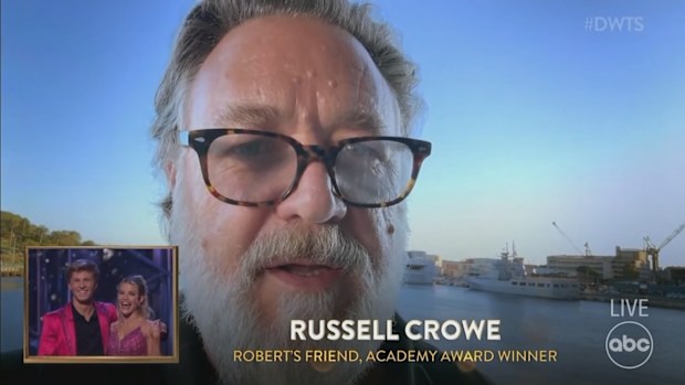 Russell Crowe appears on screen with a message for Robert Irwin during the 2025 Dancing With The Stars US finale, November 25