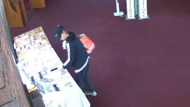 Police are searching for a woman who allegedly robbed a church while a baptism was taking place in Melbourne's south east.