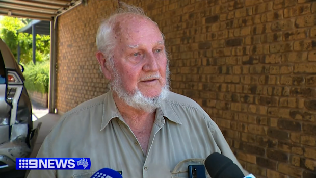 A Willaston resident was confronted by an axe-wielding driver who smashed into his backyard during a wild police chase.