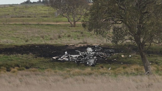 Police will work through the night to identify who was on board a light plane that crashed and burst into flames near Canberra.