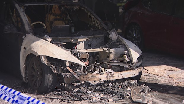 petrol has been used to torch three electric cars in Parramatta in a suspected arson attack