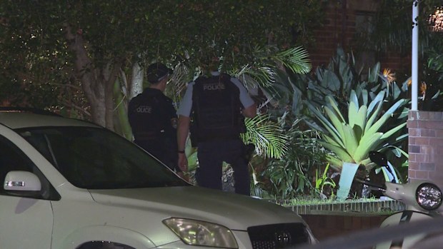 Three men are on the run this morning after allegedly storming a home armed with machetes in Sydney's eastern suburbs overnight