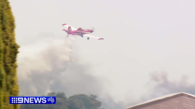 Two men are behind bars after being charged over a fire in Adelaide's north.Police allege their angle grinder started the blaze, which ripped through multiple properties in Penfield and sparked a major emergency response.