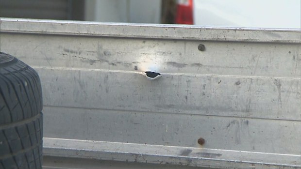 Police are searching for two gunmen who fired multiple shots at a Gold Coast home.