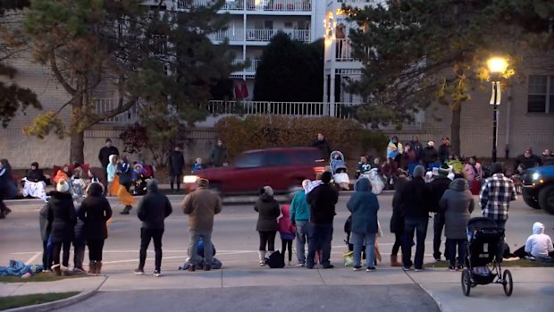 The car was caught on camera speeding past crowds