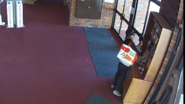 Police are searching for a woman who allegedly robbed a church while a baptism was taking place in Melbourne's south east.