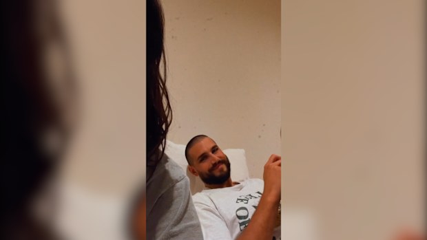 Martha Kalifatidis and Michael Brunelli recover in bed after catching coronavirus.