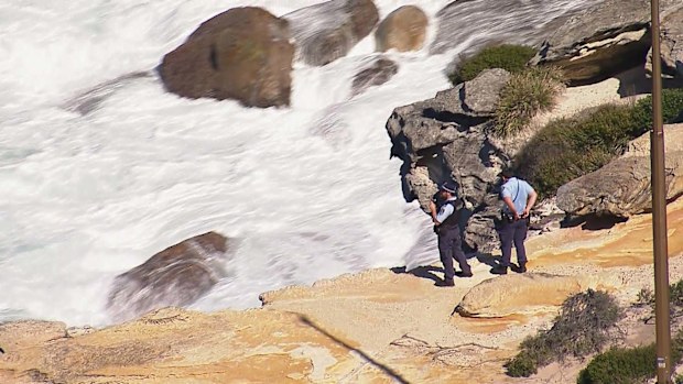 A fisherman has died and a teenager was been rushed to hospital after being washed off rocks in Sydney's south on Easter Sunday.The pair were swept into the water at Wattamolla, in the Royal National Park around 11am, in what is the sixth drowning death this Easter.