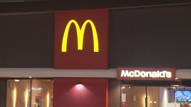 A man has been arrested after a bomb threat at a McDonald's in Adelaide's north last night. 