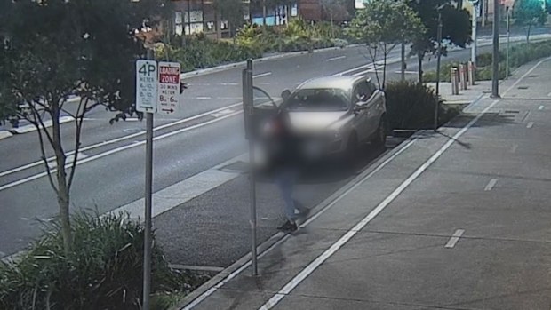 Police have released CCTV footage after an alleged armed robbery at a hotel in Sydney's CBD this morning.