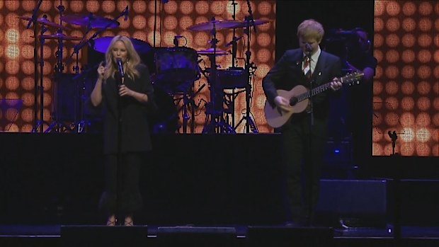 Kylie Minogue and Ed Sheeran on stage at Michael Gudinski memorial at Rod Laver Arena