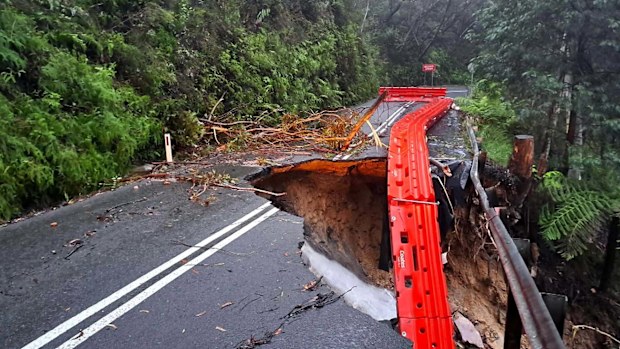 A road fell away after a months worth of rain was dumped in a day across Sydney.