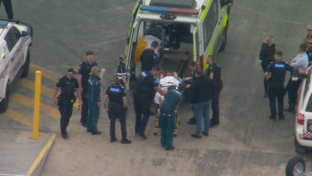 A man has been arrested after crashing an allegedly stolen ute into a house and trying to swim away from police on Queensland's Sunshine Coast.