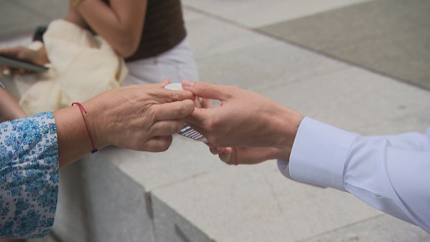 Candles were being handed out in Martin Place today.