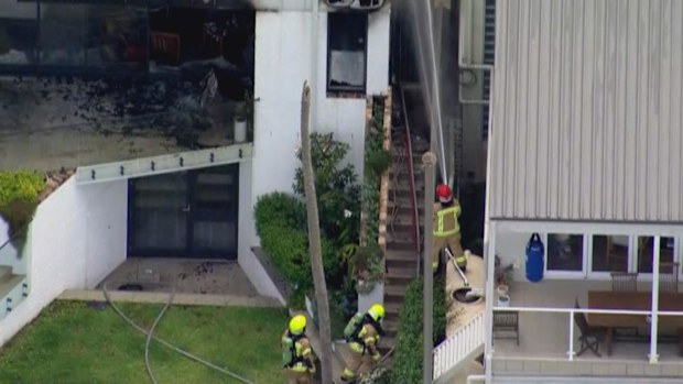 Firefighters have rushed to a multi-million dollar house in Sydney after it caught fire on Boxing Day.Flames were seen coming from the three-level home on Kent Street in Waverley, near Bondi.