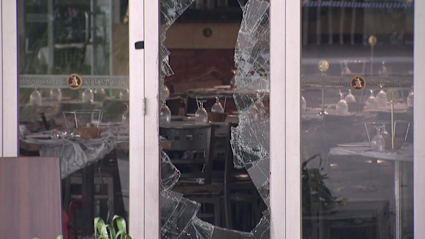 The scars from the attack are still seen at the restaurant, with glass doors being smashed in.