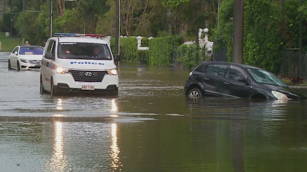 Parts of Queensland's south-east have been swamped after torrential rain which stranded multiple people in their cars in floodwaters.