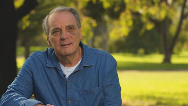 A Victorian grandfather allegedly coward punched at a caravan park said he feared he would die after two strangers came onto his site and attacked him.