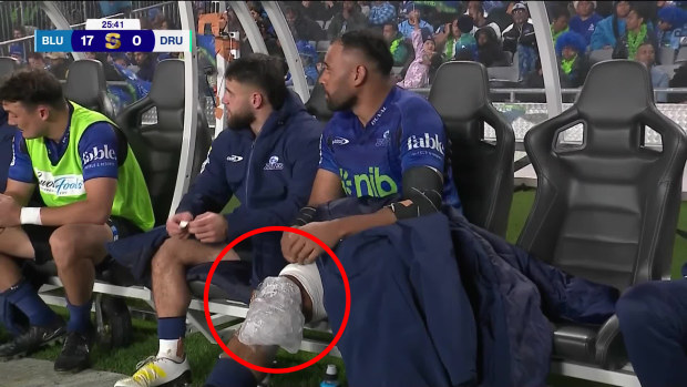 Patrick Tuipulotu sporting an ice pack on his kee in the Blues' quarter-final against the Drua.