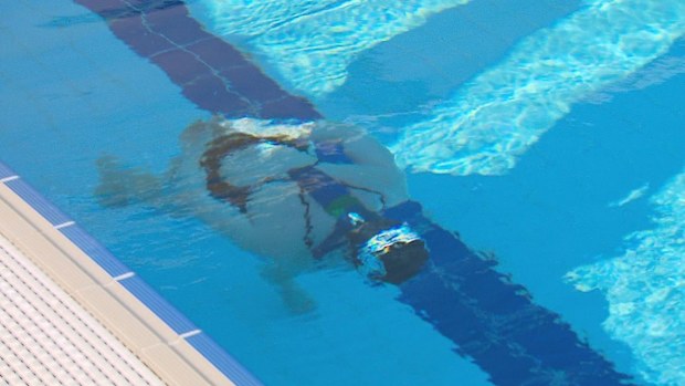 Australia's athletes are continuing to set new world records even outside the Olympic Games. Two professional free divers have held their breaths on the Gold Coast today to walk more than 100 metres underwater. Amber Bourke made her second world record attempt with a crowd of supports poolside.