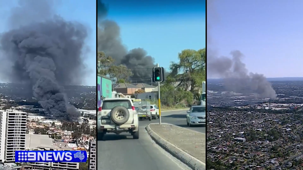 Smoke billows across Sydney's south-west as huge industrial fire burns