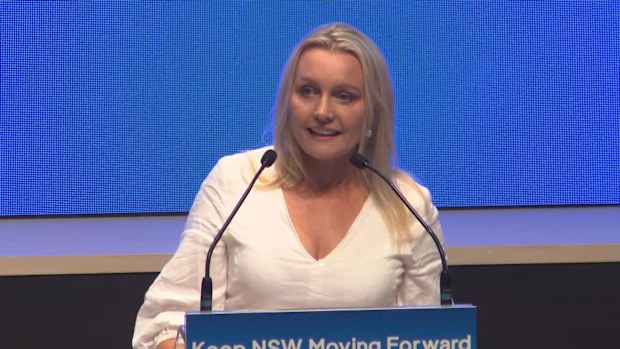 Helen Perrottet introduces her husband, NSW Premier Dominic Perrottet, to the stage.