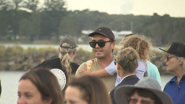 One man, pictured in the dark hat, shouted his opposition to proposed wind farms in the area.