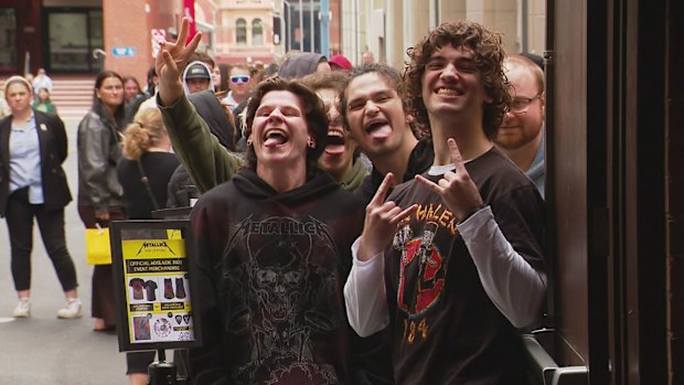 Heavy metal legends Metallica have touched down in Adelaide, with tens of thousands of fans hot on their heels, lining up in long queues to snag some unique mementos.