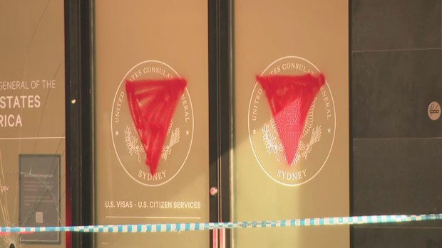 Police believe a small sledgehammer was used to smash the front windows of the US consulate in North Sydney this morning
