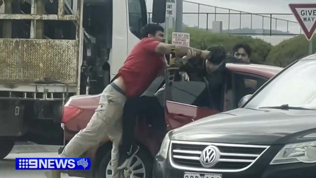 Two truck drivers have fought back after armed men tried to carjack their vehicle from a Melbourne service station carpark.