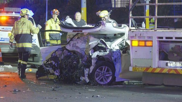 A teenager has died and his family have been seriously injured after two cars collided in Sydney's south-west. 