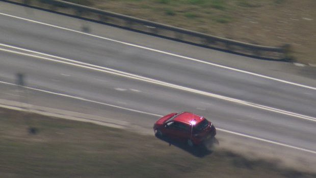 Police pursuit in Sydney's west: The driver avoided road spikes, allegedly ran through red lights and swerved in and out of vehicles.